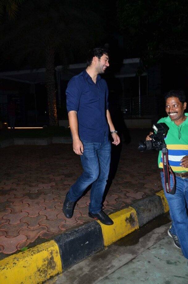 While leaving the venue, the shutterbugs gathered around asking Karan to pose but the star kid was in a hurry and looked extremely shy trying to avoid cameras