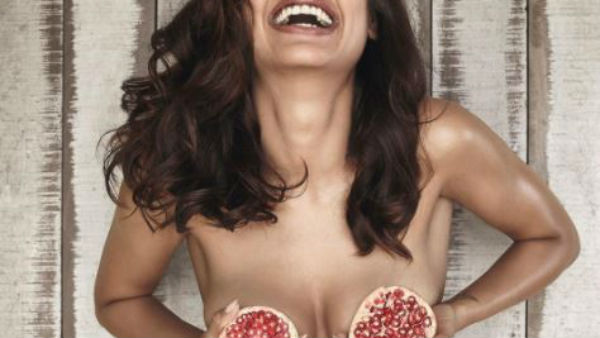 Esha Porn - IN PICS: After her BLACK & WHITE BIKINI show,Topless Esha Gupta now covers  her assets with just a pomegranate!