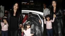 IN PICS: Aishwarya spotted with daughter Aaradhya at Airport; Hugs hubby Abhishek before leaving!