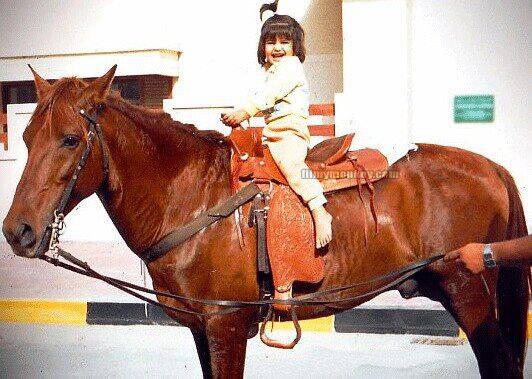 Cutie goes horse riding in childhood