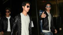 SEE PICS: Shah Rukh Khan and son Aryan twinning in black at the Airport!