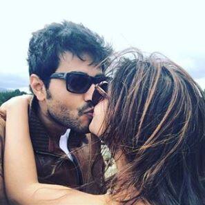The couple is kissing each other affectionately and the pic is just too romantic. (Photo: Instagram)