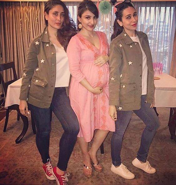 Here's a pic from the baby shower ceremony in which Kareena & Karisma are twinning while posing with Soha. (Photo: Instagram)