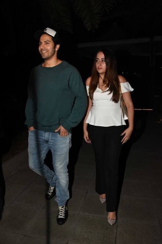 Natasha looked beautiful in a white cold-shoulder top and black trousers
