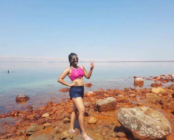 While posing in front of the dead seas, Pooja posted this pic and has captioned it as, 