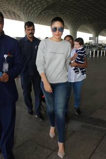 Taimur Ali Khan in TEARS at Airport; mommy Kareena tries to CHEER him up! See pics!