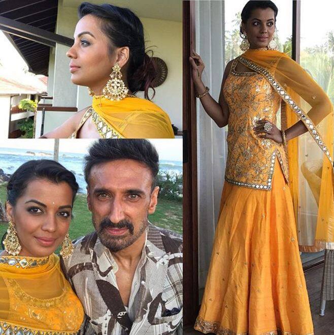 The couple visited the country to attend a family wedding and Mudha shared these gorgeous pictures from a function wearing a yellow lehenga. She wrote -