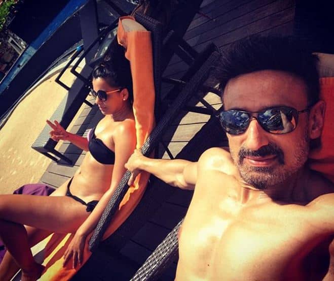 And the busy actors are also taking time out to make use of this trip, spending some romantic time together. The 'Fashion' actress slays in a black bikini posing with the shirtless beau and she captions this hot pic -