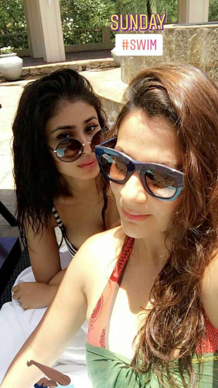 The actress can be seen posing with her friend wearing a striped bikini, isn't she looking too hot!