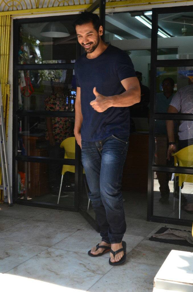 John greets cameras before fetching his dog from the clinic!