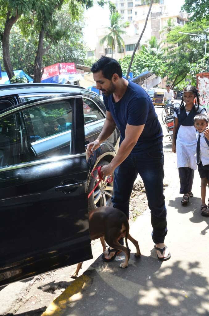 John with his dog Bailey at a veterinary clinic in Bandra