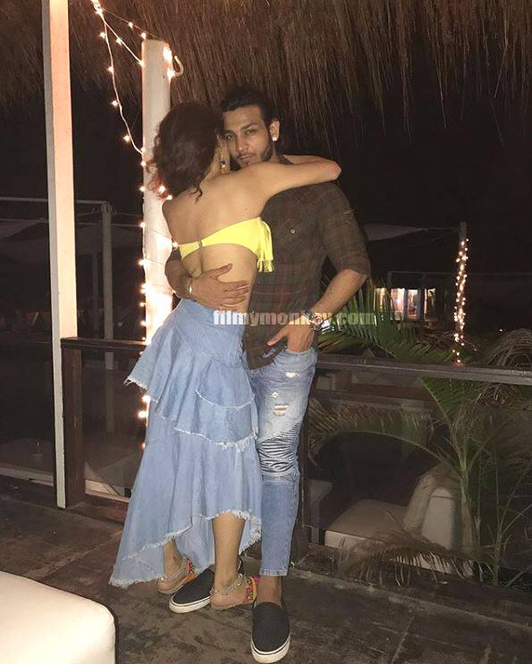 Ahem! Check out the latest picture which looks like a throwback moment from their romantic outing in June. Sonarika in a beautiful love embrace with Vikas while camera captures the cosy-romantic moment. Clad in a yellow bikini top and denim long skirt, Sonarika looks absolutely gorgeous even from behind.