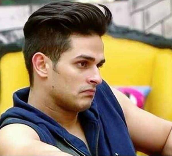 While the two were fighing, Priyank, who's a good buddy of Vikas's from before, jumped in and got physical with Aakash.