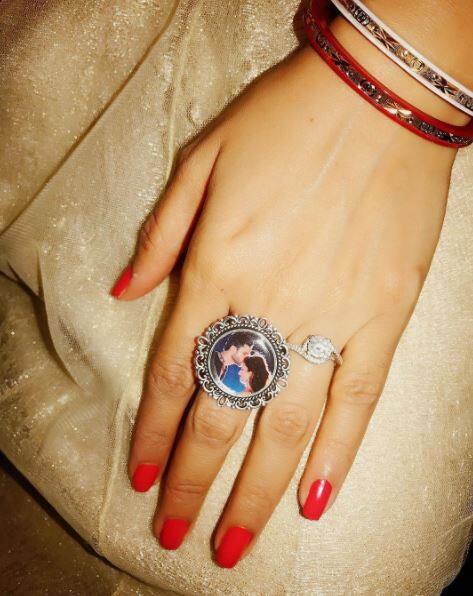 Divyanka shared this closeup pic of her hand flaunting her ring that has her and hubby Vivek's pic celebrating the day of love and bond between a husband & wife