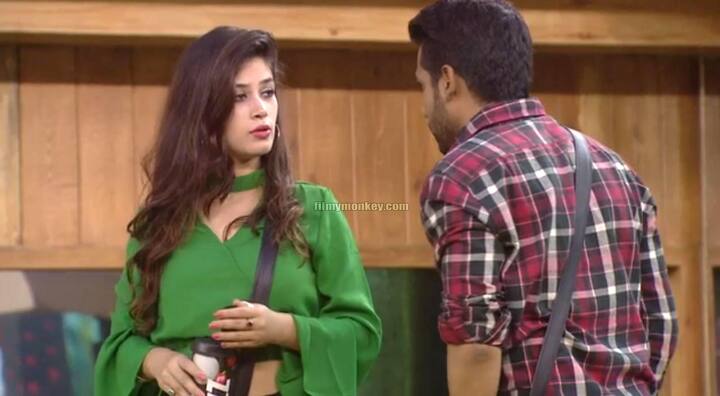 In the first week itself, 35 yr old Puneesh and 24 yr old Bandgi were seen discussing the plan to fake their romance for attention inside BB 11 house. (Pic: Colors)