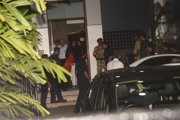Casually clad in black hoodie and white pants, when Amitabh appeared, a red banarasi cloth(saree?) catches our attention too.
