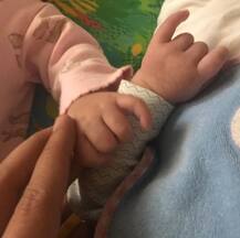 Karan Johar's baby girl Roohi looks like a cute DOLL in Varun Dhawan's arms!