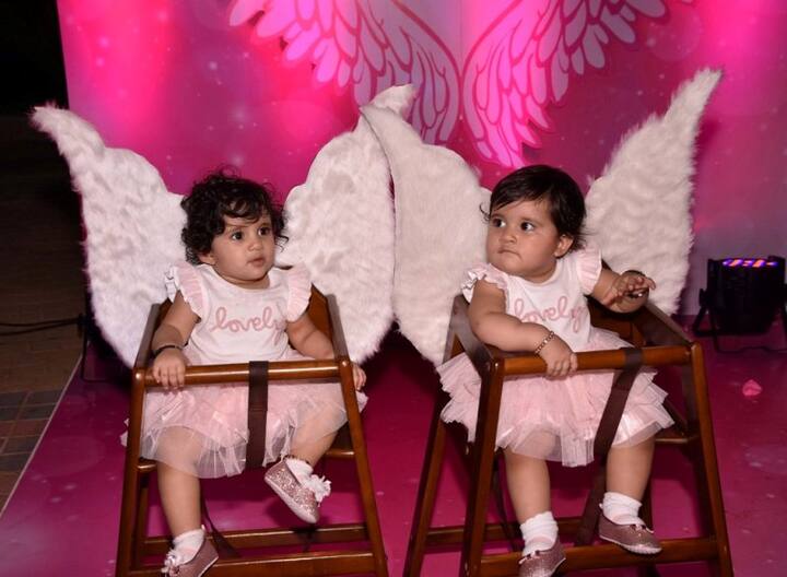 Both Vienna(l) and Bella were cute as a button in their pink dresses with matching shoes.