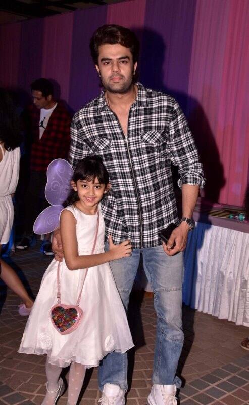 Shabbir Ahluwalia walks in with his wife Kanchi Kaul and their two adorable sons.