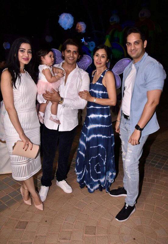 Vikas Kalantri and wife posing with the hosts