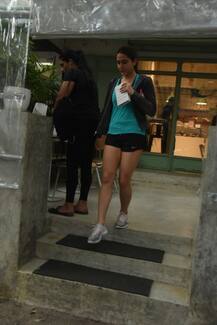 IN PICS: Saif Ali Khan’s daughter Sara Ali Khan clicked outside a cafe flaunting her toned legs in gym shorts!