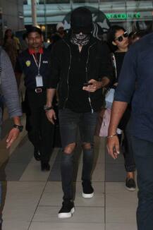 Shahid Kapoor SPOTTED with wife Mira & daughter Misha at Airport; HIDES new look with SCARF!