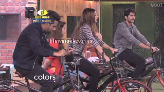 The three had to sit on cycles which were rocking side-to-side and the twist was that they had to drink water throughout the task and hold the pressure in order to win it.