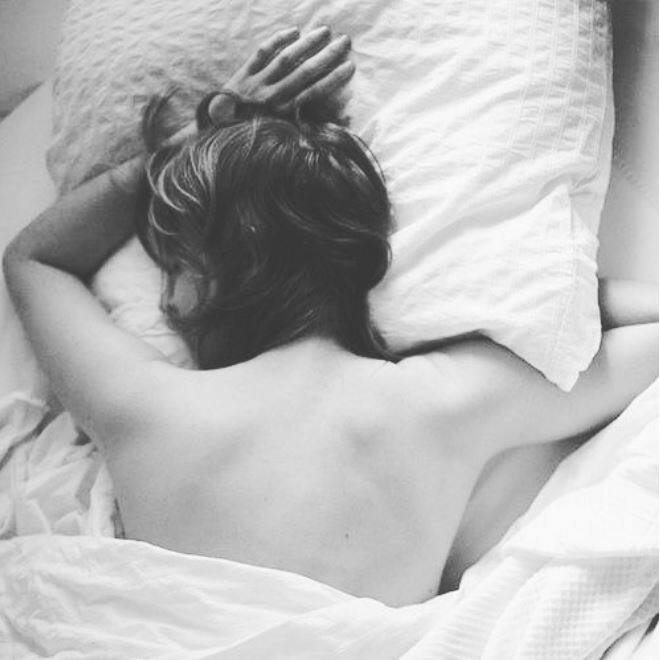 Another topless picture of Ileana in her bed.