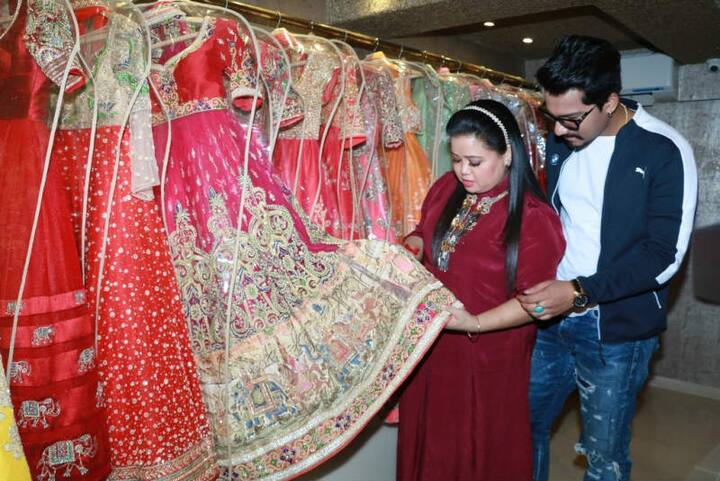 Bharti Singh checking out a Lehenga with fiance Haarsh at Neeta Lulla's showroom
