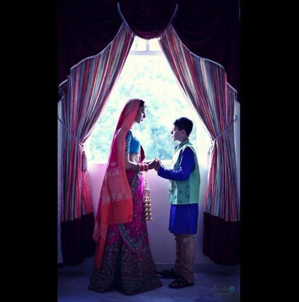 Alesia with her son at the wedding. (Photo: Instagram)