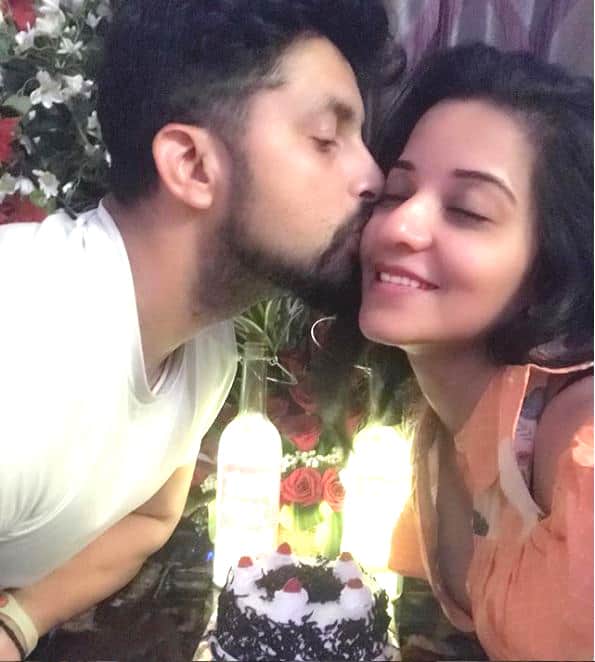 Hubby dear wished her with this romantic kiss on her cheek and she captioned the picture -