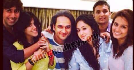 Vikas all smiles in his 'lambe-kaale-ghaney' baal...posing with Ekta Kapoor and friends.