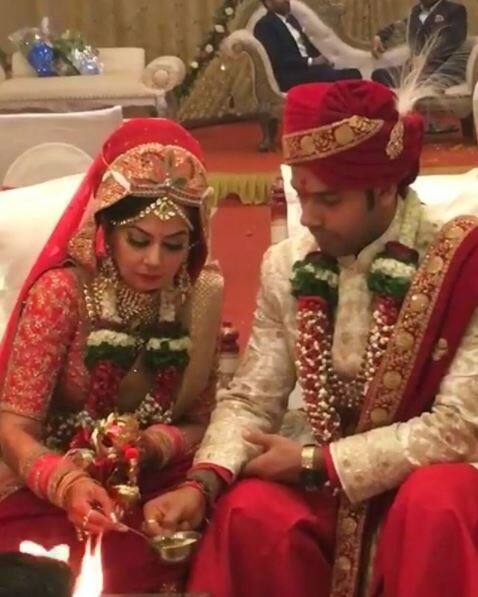 The couple snapped perfroming rituals during the ceremony. (Photo: Instagram)
