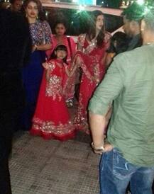 SEE PICS: Aishwarya Rai and her daughter Aaradhya Bachchan look mesmerizing in their matching red outfit at a relative's wedding!