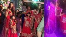 SEE PICS: Aishwarya Rai and her daughter Aaradhya Bachchan look mesmerizing in their matching red outfit at a relative's wedding!