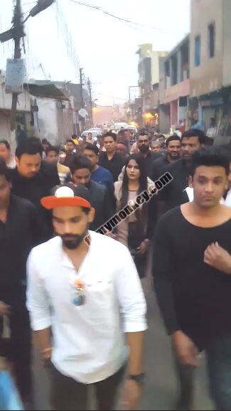 Mehjabi surrounded by fans as she walks along with husband and brother. (All Pic: Instagram)