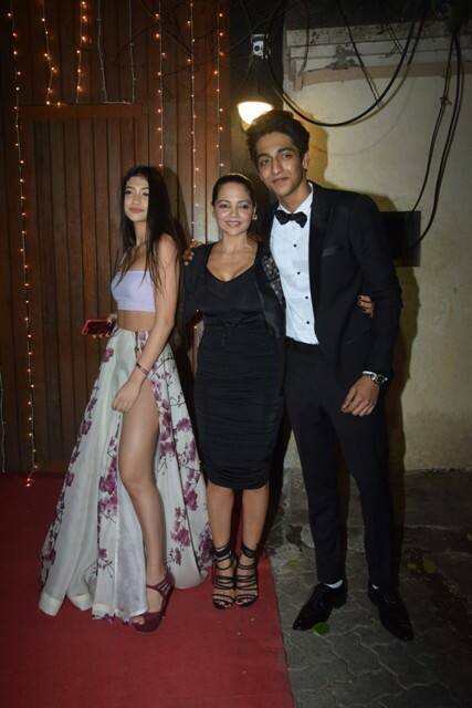Good looking family posting together!