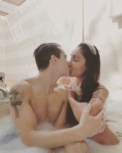 She posted another picture of her steamy romance with hubby in the bathtub & captioned it as, 
