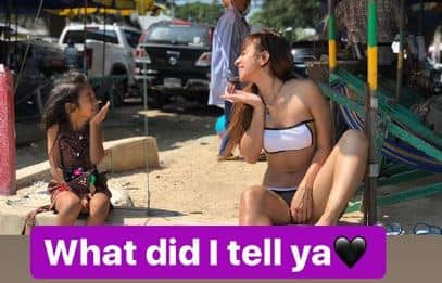Here's a cute pic in which Benafsha is giving a flying-kiss to a kid on the beach. (Photo: Instagram)