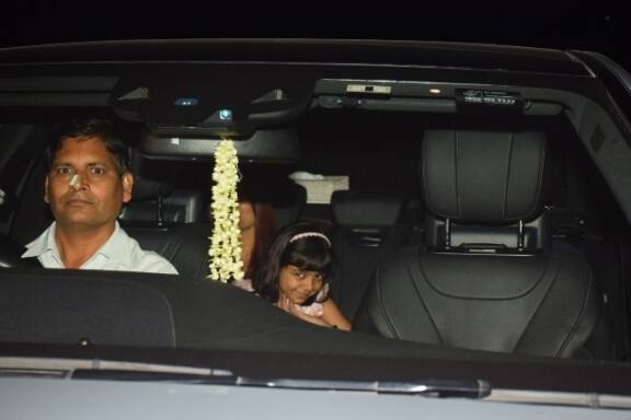 Aaradhya out on dinner with Daddy and Mommy