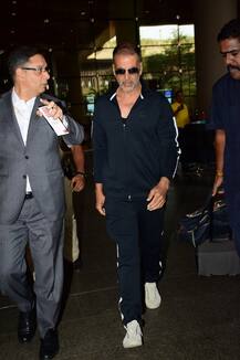 SEE PICS: Akshay Kumar & family back from their vacation; son Aarav avoids paparazzi while daughter Nitara gets playful at the airport!