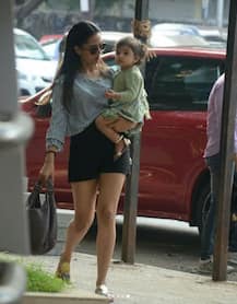 SEE PICS: Shahid Kapoor's wife Mira Rajput looks every bit of a YUMMY-MUMMY as she steps out in style with Baby Misha in arms!