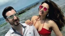Shama Sikander looks HOT as she poses with beau James in a sizzling red BIKINI!