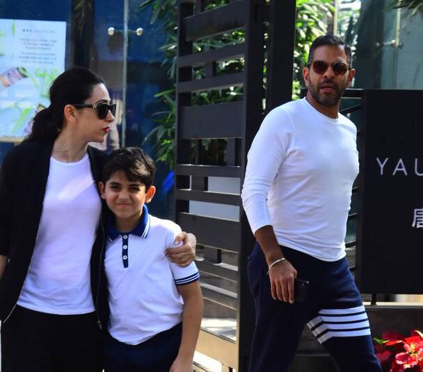 As they head out of the restaurant, Sanjay approaches his car as Karisma-Kiaan wait