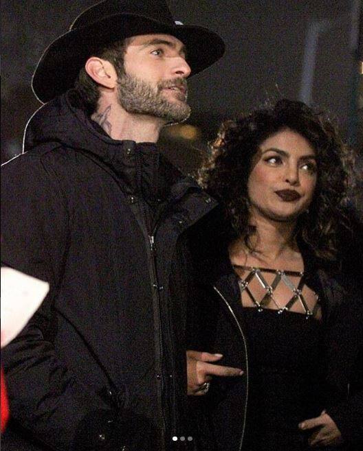 Priyanka was shooting a sequence with co-actor Alan Powell and she is being praised for the attire she wore since it was brave of her to carry that thigh high slit blac dress in the chilly weather