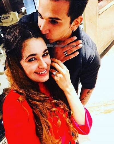 Prince posted a picture with Yuvika where he's seen adorably kissing her on the side of her forehead while their rings shine on their fingers and he wrote with it -