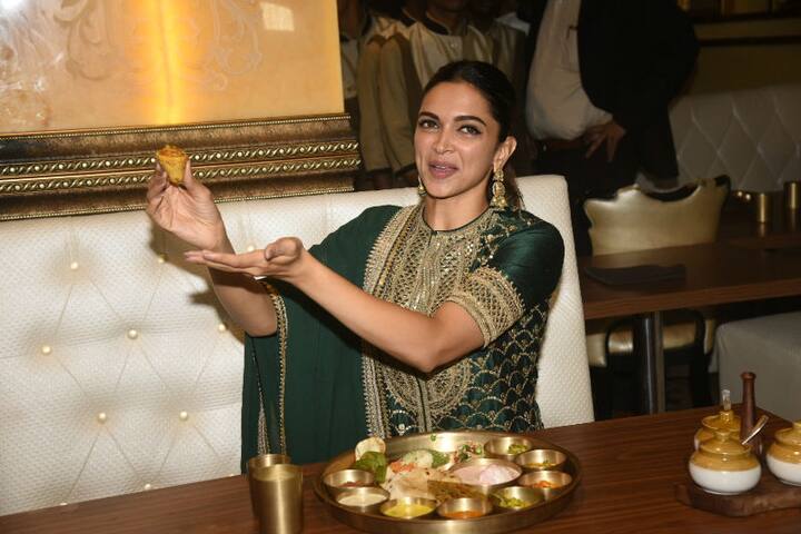 Deepika clicked candid as she posed with the thali