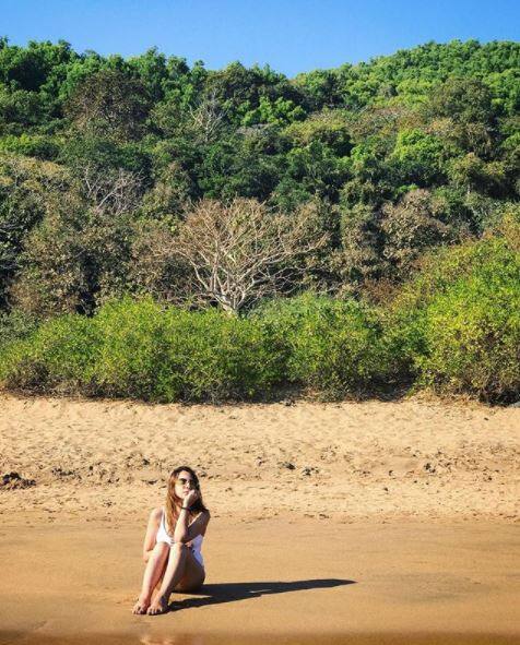 The actress also opted for a white monokini while chilling on the beach 