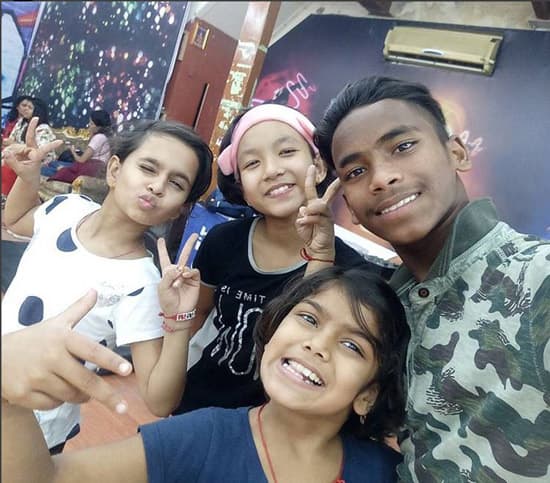 Oh! and some of them have grown too.. can you recognize them? Famous for her 'masoom-wave', Masoom has cut her hair short while the double-cart wheel guy Laxman is a big guy now.