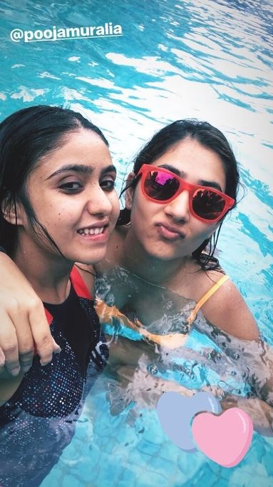 Disha posing with a friend in the pool. (Photo: Instagram)